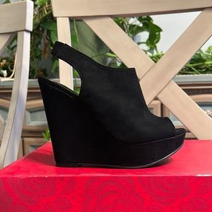Basically brand new black open toe wedges “BECKET” by CARLOS